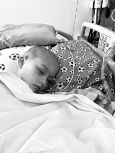 Young boy in.a hospital bed